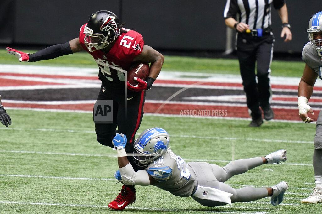 Brynn Anderson Atlanta Falcons running back Todd Gurley (21) runs against Detroit Lions strong safety Duron Harmon (26) during the second half of an NFL football game, Sunday, Oct. 25, 2020, in Atlanta. (AP Photo/Brynn Anderson)