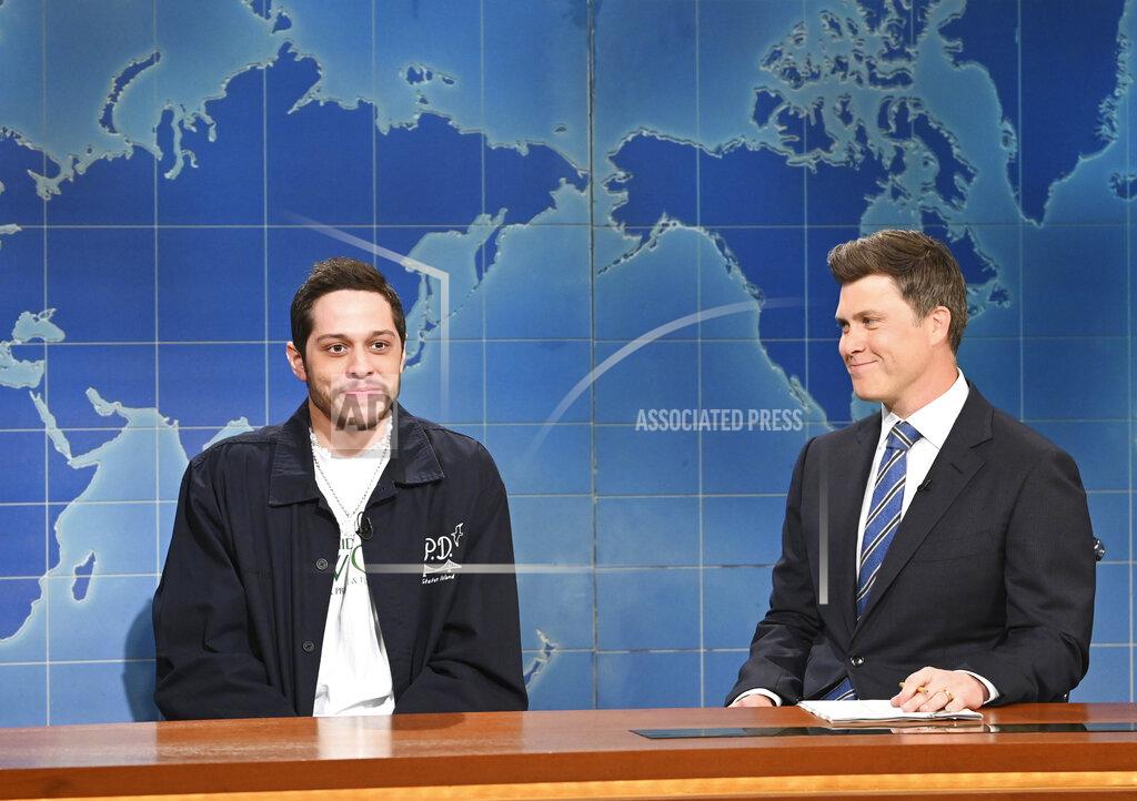 Will Heath This image released by NBC shows Pete Davidson, left, and Colin Jost during the "Weekend Update" segment on "Saturday Night Live" in New York on May 21, 2022. (Will Heath/NBC via AP)