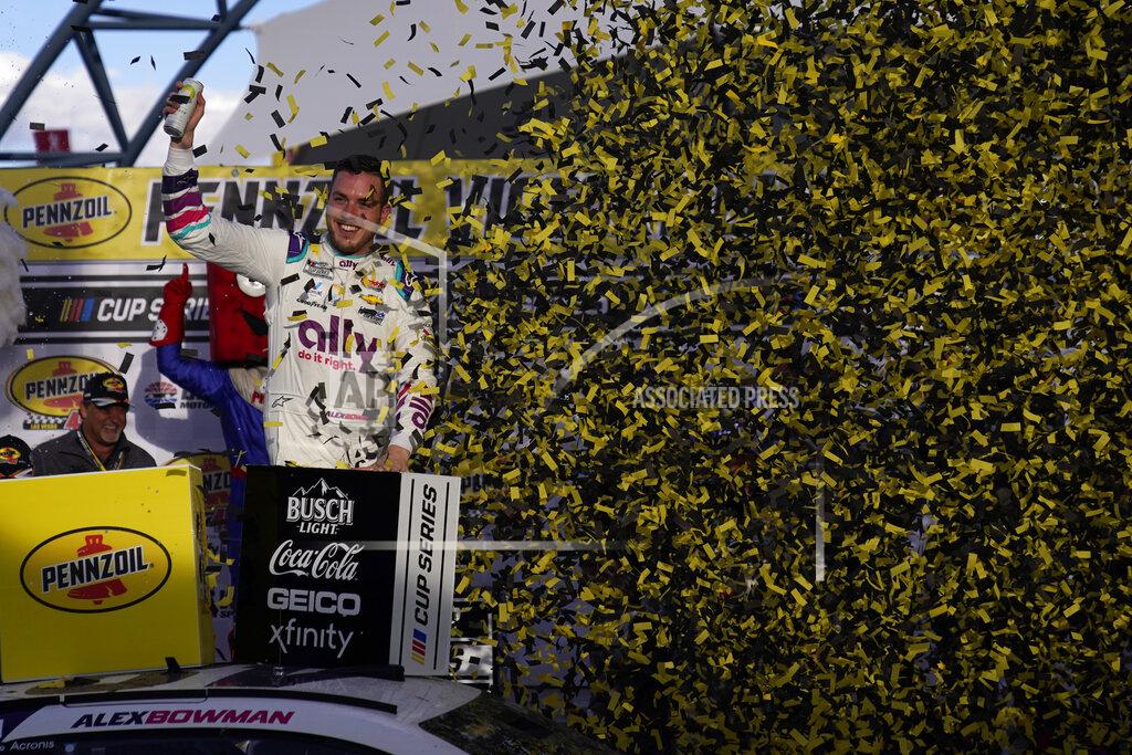 John Locher Alex Bowman (48) celebrates after winning a NASCAR Cup Series auto race Sunday, March 6, 2022, in Las Vegas. (AP Photo/John Locher)