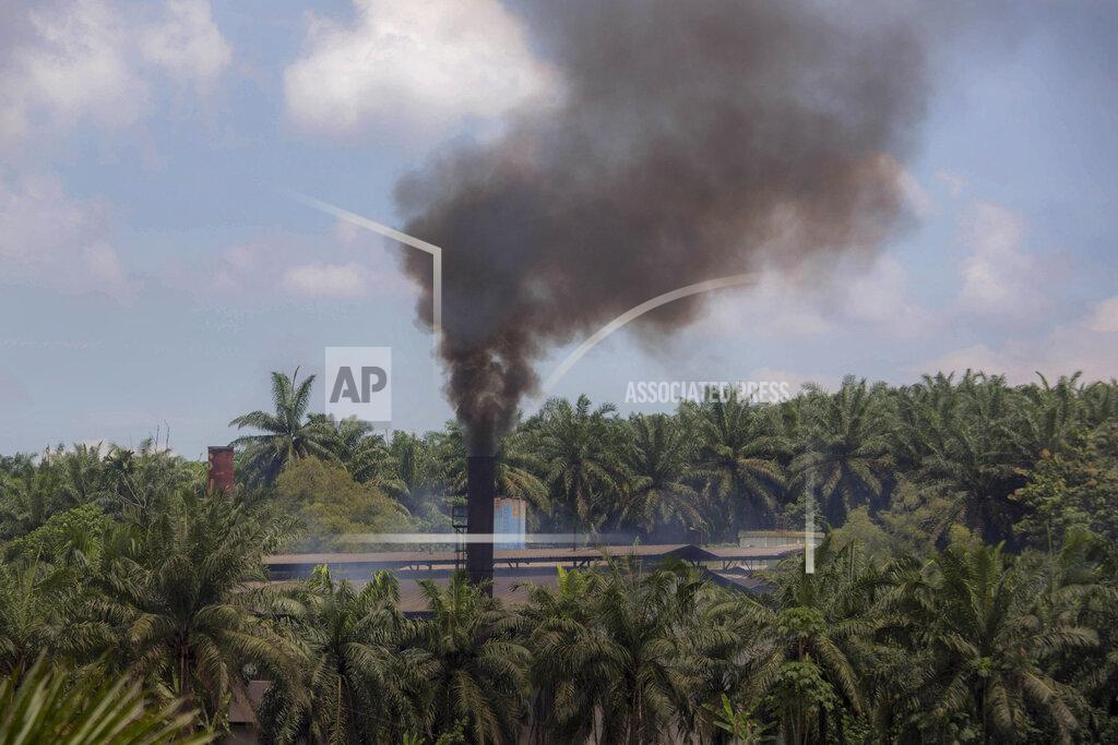 Uncredited Smoke rises from a processing mill at a palm oil plantation in Sumatra, Indonesia, Saturday, Sept. 8, 2018. Though labor issues have largely been ignored, the punishing effects of palm oil on the environment have been decried for years. (AP Photo)