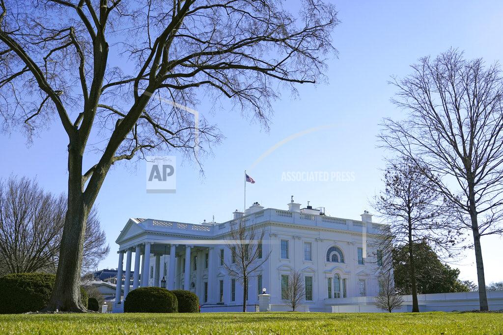 Patrick Semansky An American flag flies above the White House in Washington, Sunday, Jan. 10, 2021. (AP Photo/Patrick Semansky)
