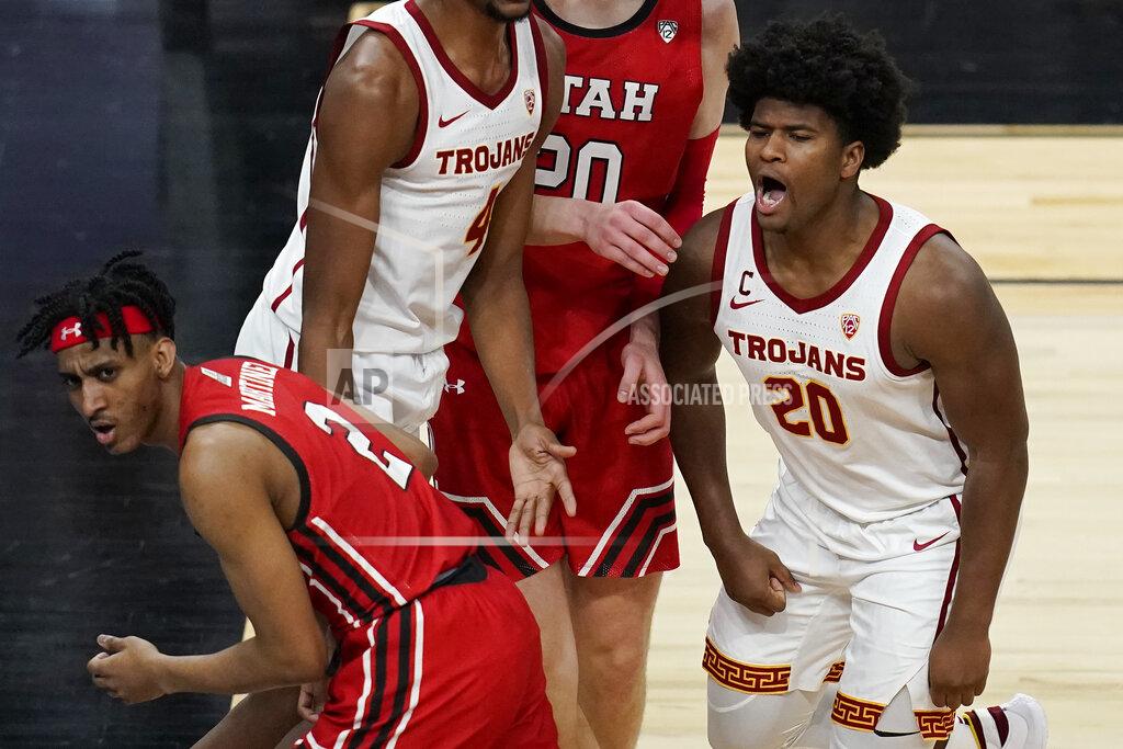 John Locher Southern California's Ethan Anderson (20) celebrates after a play against Utah during the second half of an NCAA college basketball game in the quarterfinal round of the Pac-12 men's tournament Thursday, March 11, 2021, in Las Vegas. (AP Photo/John Locher)