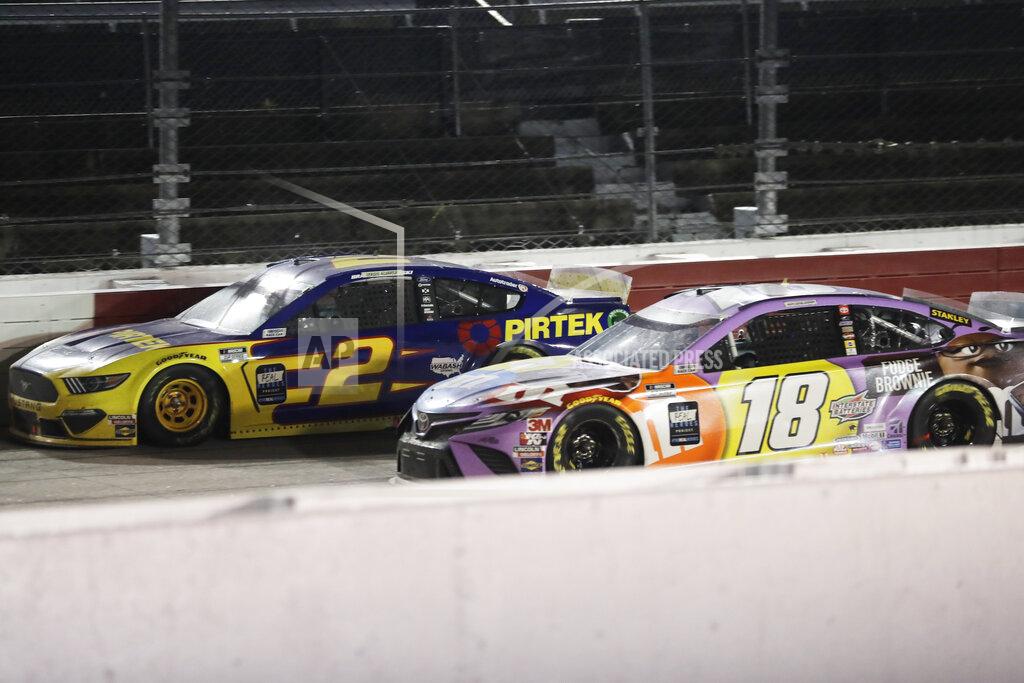 Brynn Anderson Brad Keselowski (2) and Kyle Busch (18) battle during the NASCAR Cup Series auto race Wednesday, May 20, 2020, in Darlington, S.C. (AP Photo/Brynn Anderson)