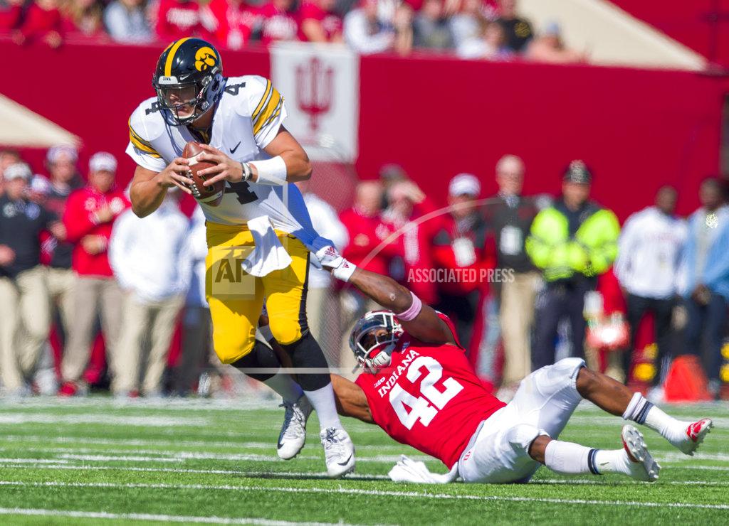 Doug Mcschooler Indiana defensive back Marcelino Ball (42) tries to sack Iowa quarterback Nate Stanley (4) during the first half of an NCAA college football game Saturday, Oct. 13, 2018, in Bloomington, Ind. (AP Photo/Doug McSchooler)