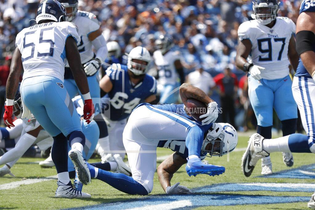 Wade Payne Indianapolis Colts tight end Eric Ebron (85) falls into the end zone as he scores a touchdown against the Tennessee Titans in the first half of an NFL football game Sunday, Sept. 15, 2019, in Nashville, Tenn. (AP Photo/Wade Payne)