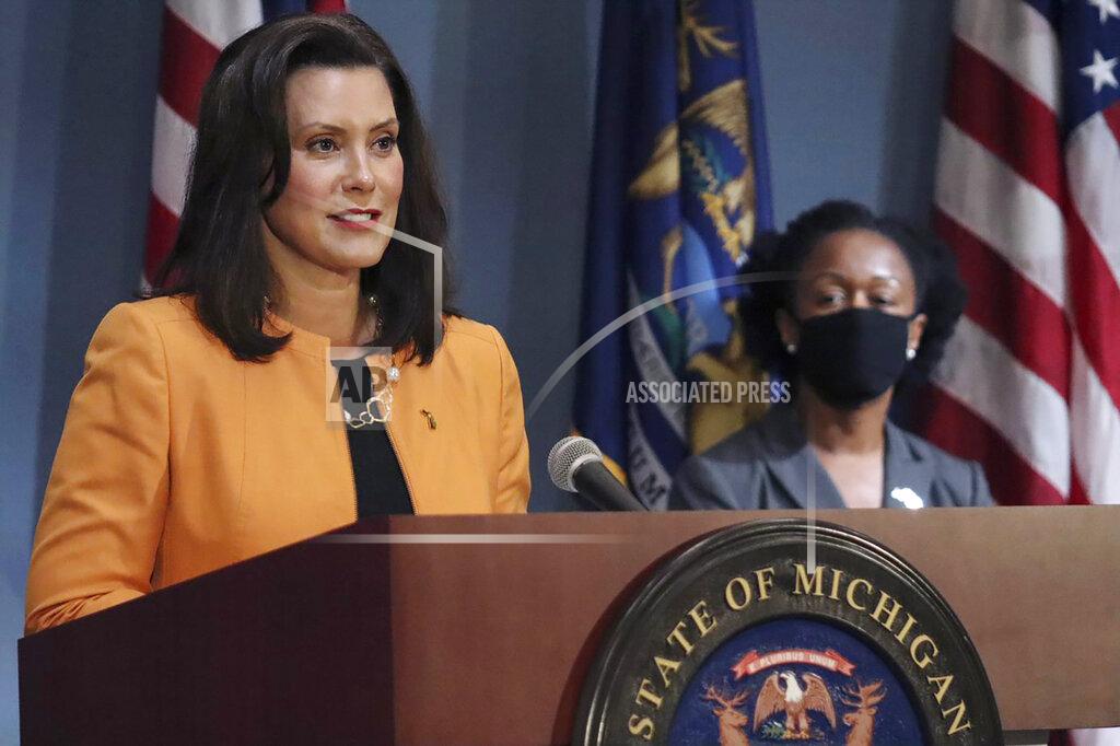 Uncredited FILE - In this Aug. 19, 2020, file photo, provided by the Michigan Office of the Governor, Michigan Gov. Gretchen Whitmer addresses the state during a speech in Lansing, Mich. Court majorities are at stake beyond Washington, D.C., as voters chose justices for state supreme courts that have been thrust into politicized clashes over voter access and the emergency powers of governors fighting the coronavirus outbreak. Michigan Gov. Gretchen Whitmer, a Democrat, wants to flip control of the state’s Republican-majority high court .(Michigan Office of the Governor via AP, File)