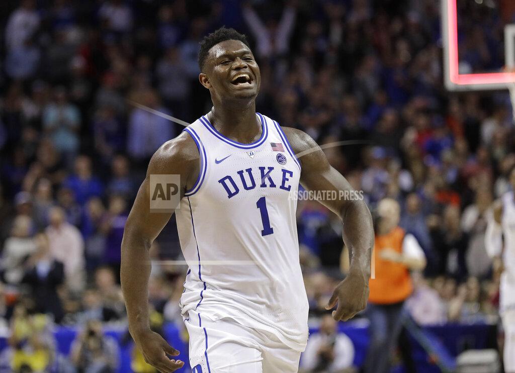 Duke's Zion Williamson (1) celebrates after Duke defeated Florida State in the NCAA college basketball championship game of the Atlantic Coast Conference tournament in Charlotte, N.C., Saturday, March 16, 2019. (AP Photo/Nell Redmond)