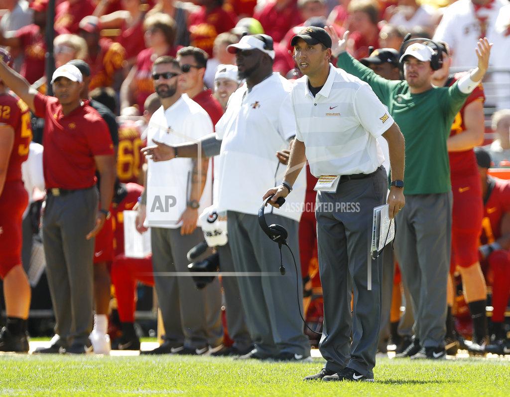Matthew Putney Iowa State head coach Matt Campbell, right, disputes a flag with an official during the second half of an NCAA college football game against Oklahoma, Saturday, Sept. 15, 2018, in Ames, Iowa. Oklahoma won 37-27. (AP Photo/Matthew Putney)