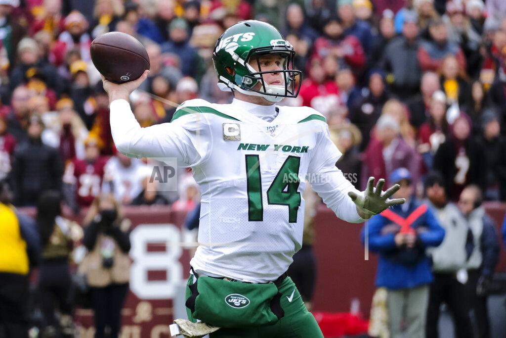 Mark Tenally New York Jets quarterback Sam Darnold (14) throws a touchdown pass in the first half of an NFL football game against the Washington Redskins, Sunday, Nov. 17, 2019, in Landover, Md. (AP Photo/Mark Tenally)