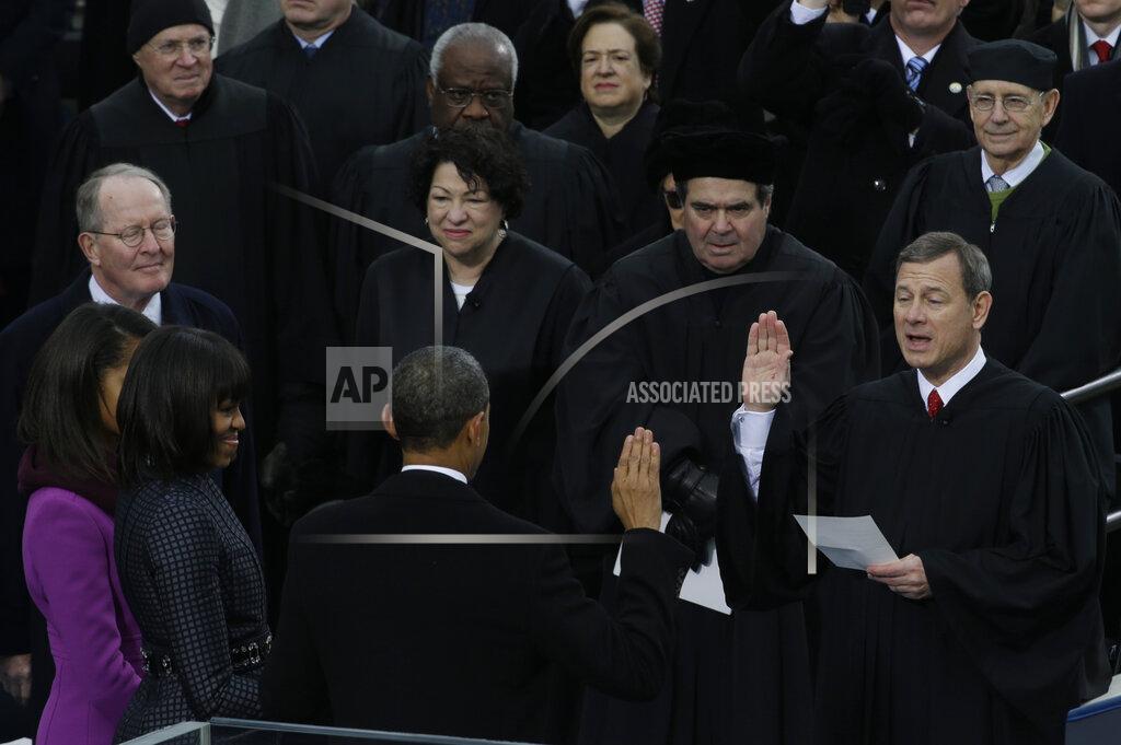 FILE - In this Jan. 21, 2013, file photo Chief Justice John Roberts, right, reads the oath of office to President Barack Obama at the ceremonial swearing-in at the U.S. Capitol during the 57th Presidential Inauguration in Washington. (AP Photo/Paul Sancya, File)