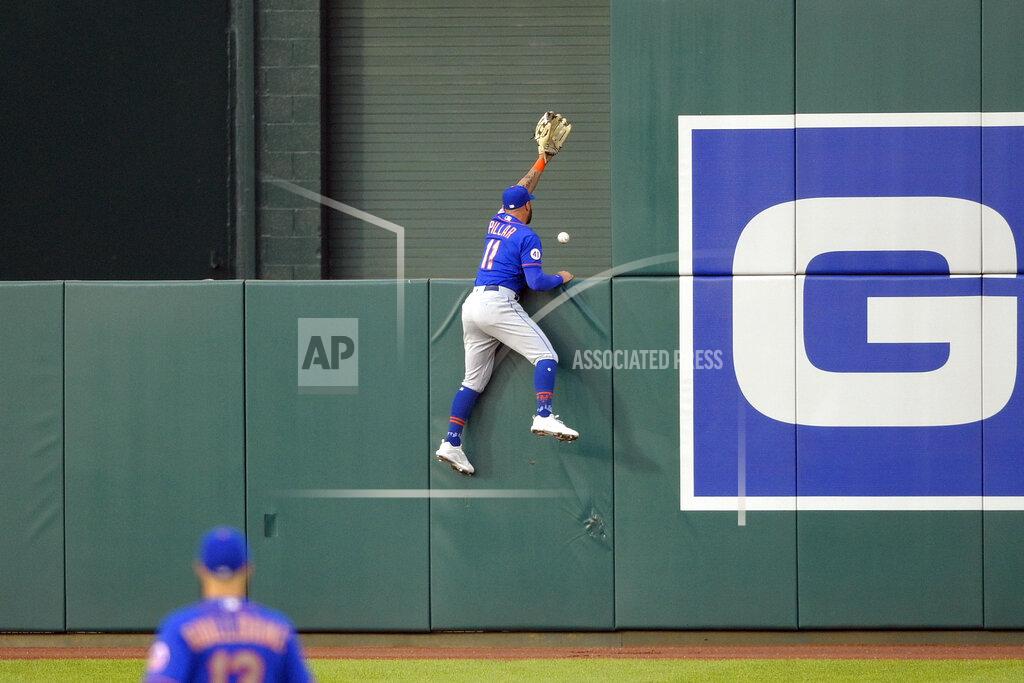 Nick Wass New York Mets center fielder Kevin Pillar watches a ball hit for a home run by Washington Nationals' Lane Thomas during the first inning of the second baseball game of a doubleheader, Saturday, Sept. 4, 2021, in Washington. (AP Photo/Nick Wass)