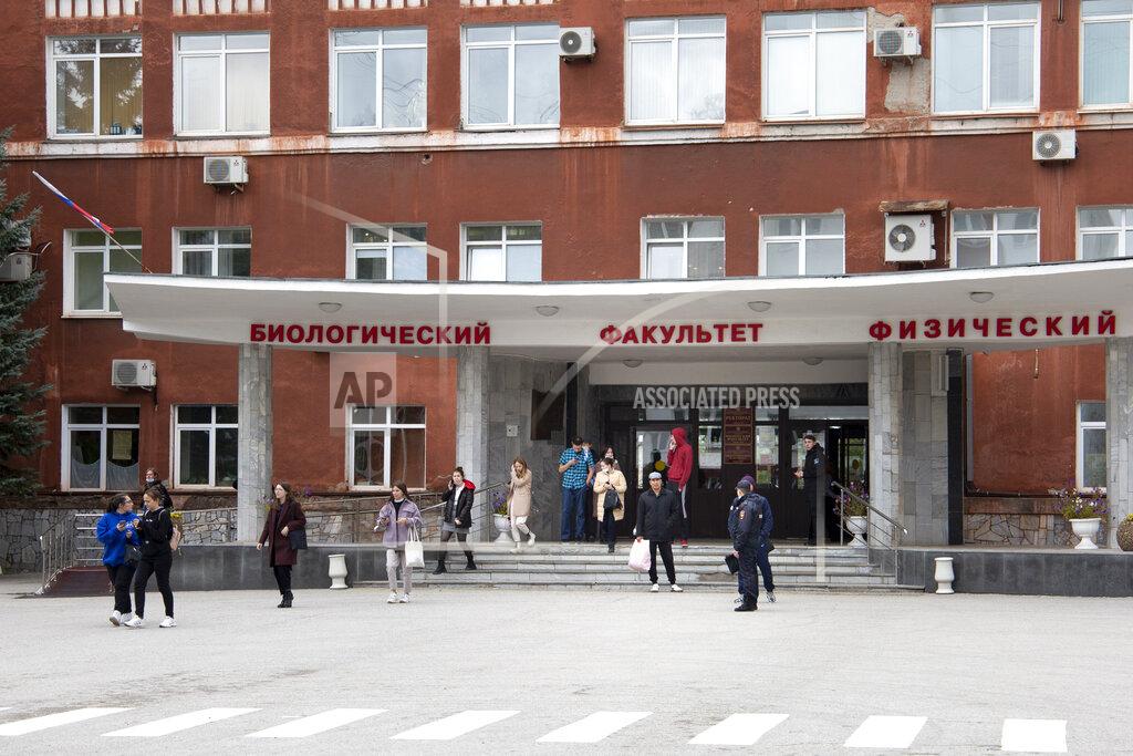 Anastasia Yakovleva Students leave the Perm State University in Perm, about 1,100 kilometers (700 miles) east of Moscow, Russia, Monday, Sept. 20, 2021. A gunman opened fire in a university in the Russian city of Perm on Monday morning, leaving at least eight people dead and others wounded, according to Russia's Investigative Committee. (AP Photo/Anastasia Yakovleva)