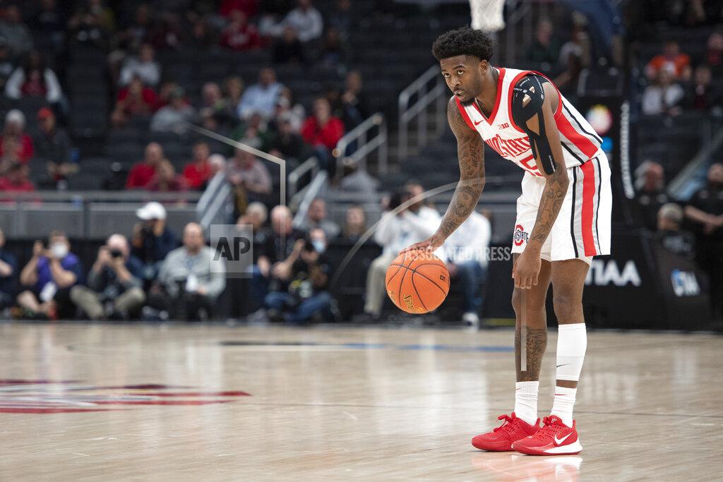 Noah Riffe Ohio State guard Jamari Wheeler (55) dribbles during an NCAA college basketball game against Penn State in the Big Ten Conference tournament Thursday, March 10, 2022, in Indianapolis. (Noah Riffe/Centre Daily Times via AP)