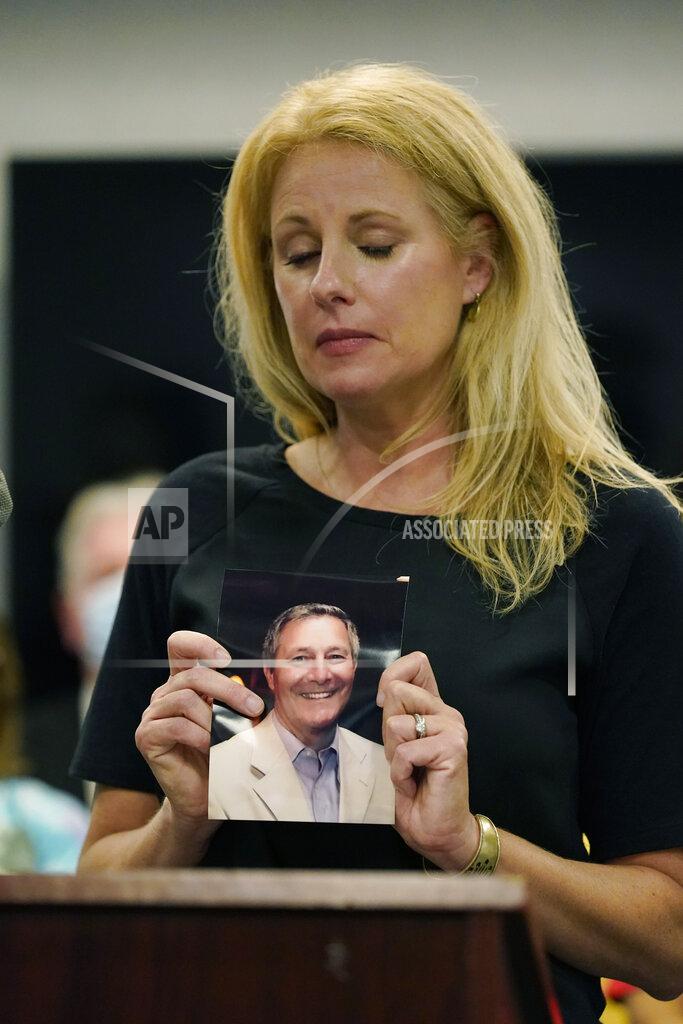 Jacqueline Temple Rudder, pauses as she speaks about how a medical marijuana treatment would have helped her late father-in-law Ed Rudder deal with pancreatic cancer, during an Initiative 65 rally of patients and parents in Ridgeland, Miss., Tuesday, Oct. 27, 2020. Initiative 65 would amend the Mississippi Constitution to allow the prescription by a doctor of up to 5 ounces (142 grams) of marijuana per month for people who suffer from more than 20 medical conditions. The state lawmakers are offering a more restrictive measure as an alternative. (AP Photo/Rogelio V. Solis)