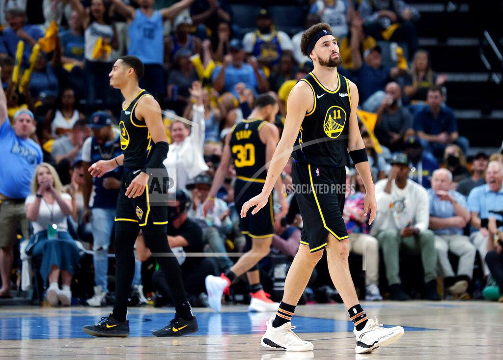 Carlos Avila Gonzalez Golden State Warriors Klay Thompson (11) reacts to a foul call during the first half of Game 5 of an NBA basketball second-round playoff series against the Memphis Grizzlies, Wednesday, May 11, 2022, in Memphis, Tenn. (Carlos Avila Gonzalez/San Francisco Chronicle via AP)