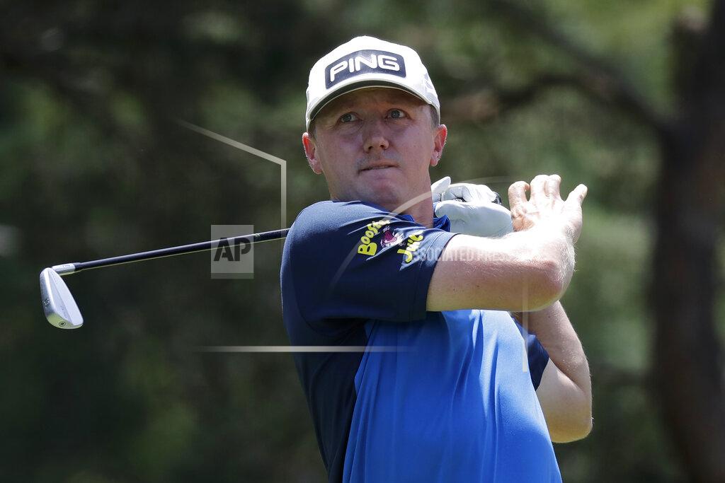 Darron Cummings Mackenzie Hughes, of Canada, hits from the second tee during the third round of the Memorial golf tournament, Saturday, July 18, 2020, in Dublin, Ohio. (AP Photo/Darron Cummings)