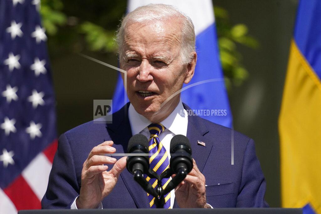 Andrew Harnik FILE - President Joe Biden accompanied by Swedish Prime Minister Magdalena Andersson and Finnish President Sauli Niinisto, speaks in the Rose Garden of the White House in Washington, Thursday, May 19, 2022. On Friday, May 20, The Associated Press reported on stories circulating online incorrectly claiming the Biden administration is proposing amendments to the World Health Organization’s International Health Regulations that would transfer U.S. sovereign authority over health care decisions to the WHO director-general. (AP Photo/Andrew Harnik, File)