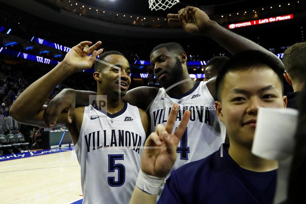 Matt Slocum Villanova's Phil Booth, left, and Eric Paschall celebrate after an NCAA college basketball game against Butler, Saturday, March 2, 2019, in Philadelphia. Villanova won 75-54. (AP Photo/Matt Slocum)