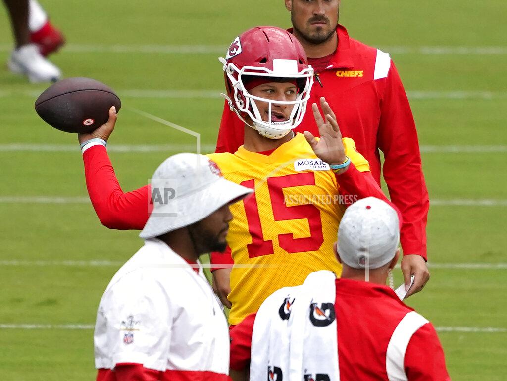 Ed Zurga Kansas City Chiefs quarterback Patrick Mahomes (15) passes during drills at the team's NFL football training camp Saturday, July 31, 2021 in St. Joseph, Mo. (AP Photo/Ed Zurga)