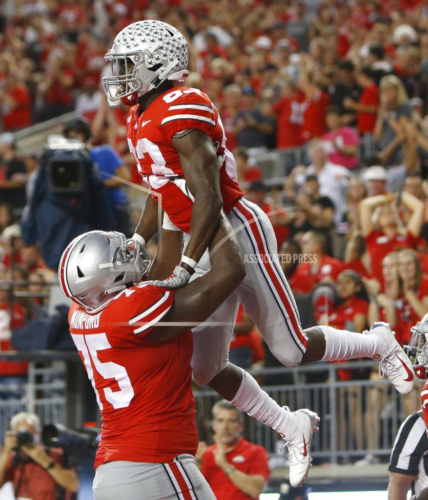 Jay Laprete Ohio State receiver Terry McLaurin, top, celebrates his touchdown against Indiana with teammate Thayer Munford during the second half of an NCAA college football game Saturday, Oct. 6, 2018, in Columbus, Ohio. (AP Photo/Jay LaPrete)