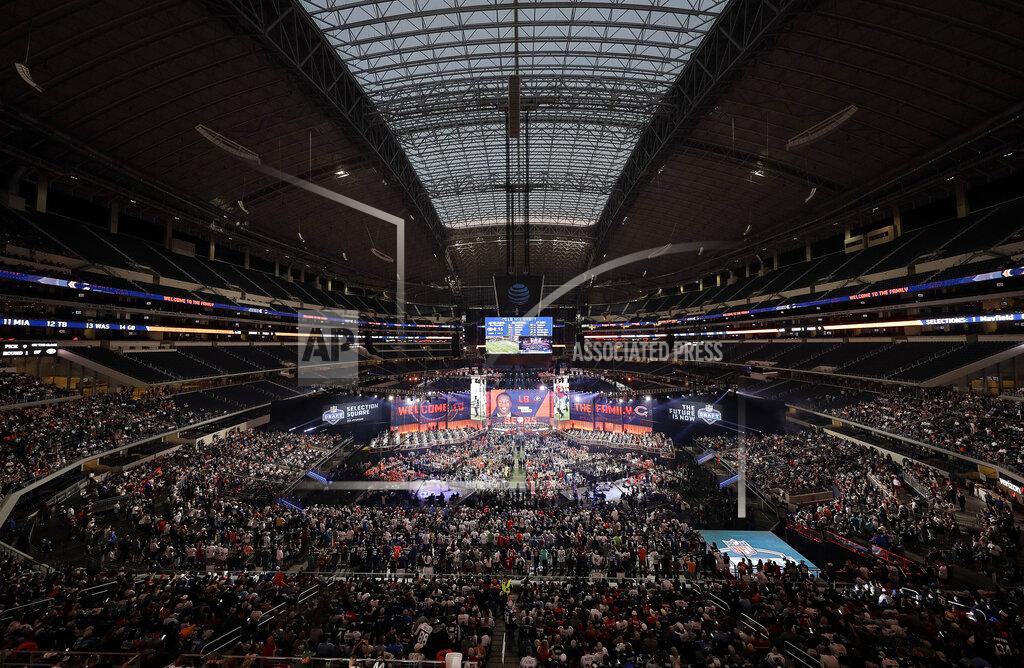 David J. Phillip FILE - This April 26, 2018, file photo, shows a general overall view of AT&T Stadium as Georgia's Roquan Smith is selected by the Chicago Bears during the first round of the NFL football draft, in Arlington, Texas. The NFL draft has become an industry unto itself and the league's third-most popular annual event behind the Super Bowl and opening weekend. (AP Photo/David J. Phillip, File)