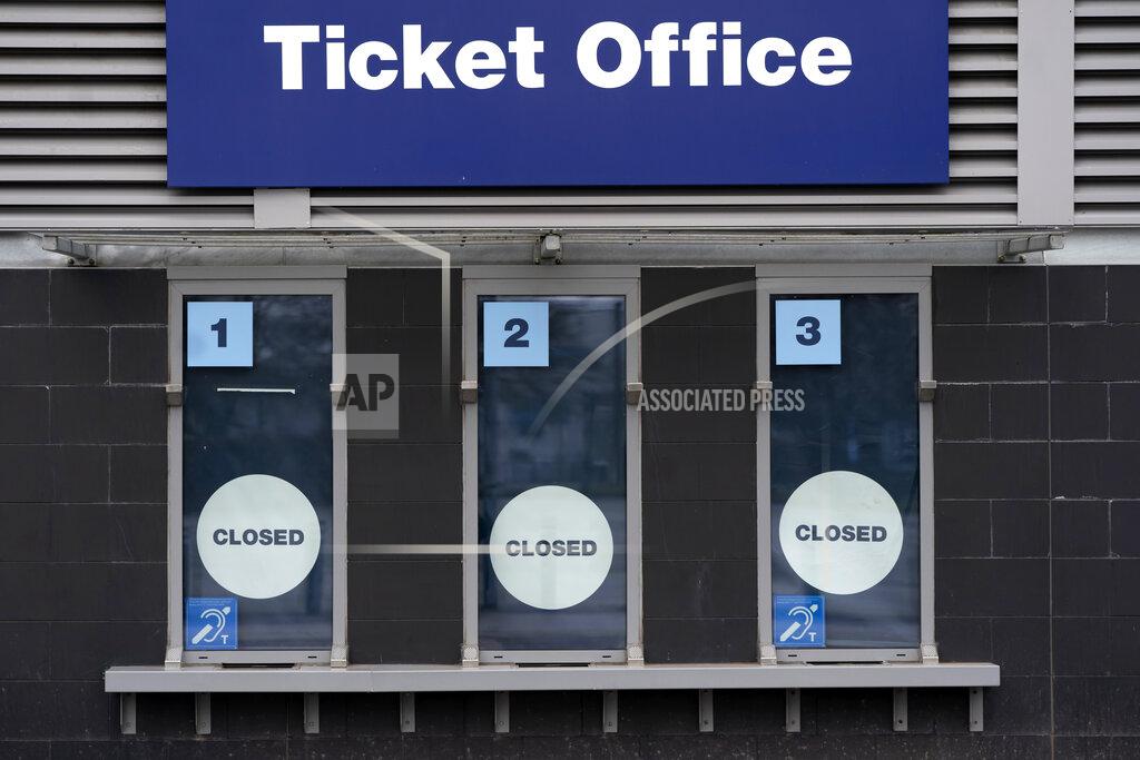 Jon Super FILE - In this March 14, 2020, file photo, a closed ticket office is shown at Etihad Stadium where Manchester City were due to play Burnley in an English Premier League soccer match, in Manchester, England. Most of the the NFL's 32 teams will start the season without fans, and three — both New York teams and Philadelphia — have already ruled out fans in 2020. (AP Photo/Jon Super, File)