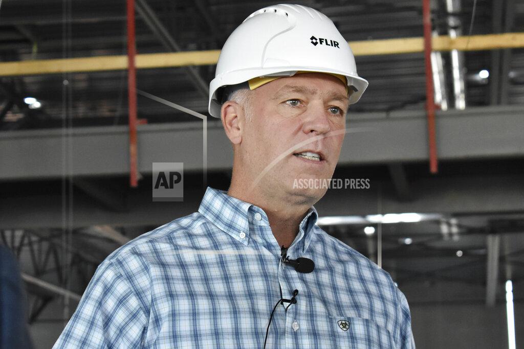 Matthew Brown Montana U.S. Rep. and gubernatorial candidate Greg Gianforte speaks after touring a high tech manufacturing facility in Bozeman, Mont., Sept. 2, 2020. Gianforte, a Republican, and his Democratic opponent, Lt. Gov. Mike Cooney, both pledge to rely on the advice of public health professionals, but their approach to the virus has differed at every turn of the campaign. (AP Photo/Matthew Brown)