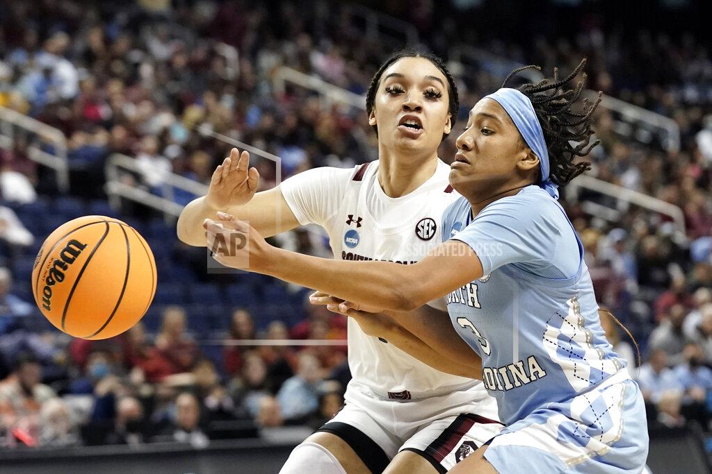 Gerry Broome South Carolina guard Brea Beal, left, defends against North Carolina guard Kennedy Todd-Williams (3) during the first half of a college basketball game in the Sweet 16 round of the NCAA tournament in in Greensboro, N.C., Friday, March 25, 2022. (AP Photo/Gerry Broome)