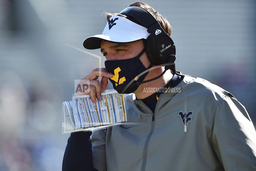William Wotring West Virginia head coach Neal Brown looks on during an NCAA college football game against Kansas, Saturday, Oct. 17, 2020, in Morgantown, W.Va. (William Wotring/The Dominion-Post via AP)