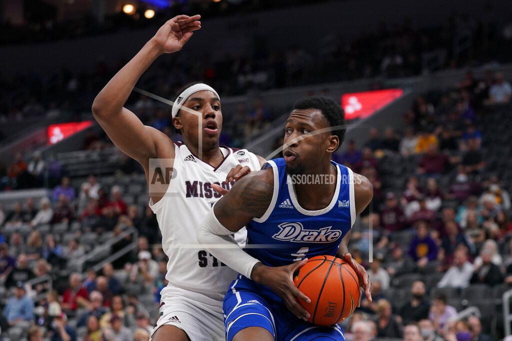 Jeff Roberson Drake's ShanQuan Hemphill, right, looks to pass as Missouri State's Donovan Clay defends during the first half of an NCAA college basketball game in the semifinal round of the Missouri Valley Conference tournament Saturday, March 5, 2022, in St. Louis. (AP Photo/Jeff Roberson)