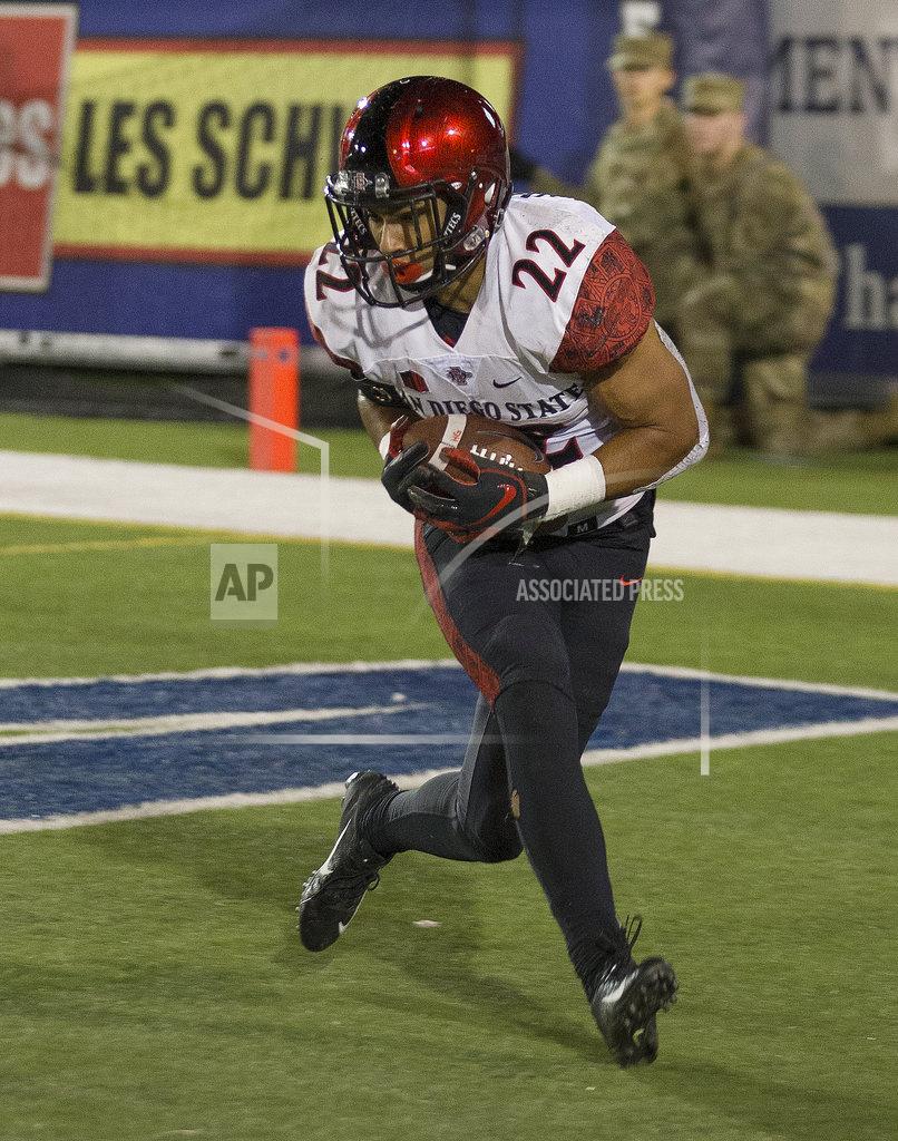Tom R. Smedes San Diego State running back Chase Jasmin (22) makes the catch in the end zone for a touchdown against Nevada in the first half of an NCAA college football game in Reno, Nev., Saturday, Oct. 27, 2018. (AP Photo/Tom R. Smedes)