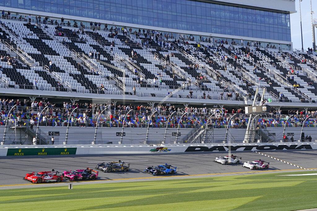 John Raoux Felipe Nasr, far left, of Brazil, leads the field to start of the Rolex 24 hour auto race at Daytona International Speedway, Saturday, Jan. 30, 2021, in Daytona Beach, Fla. (AP Photo/John Raoux)