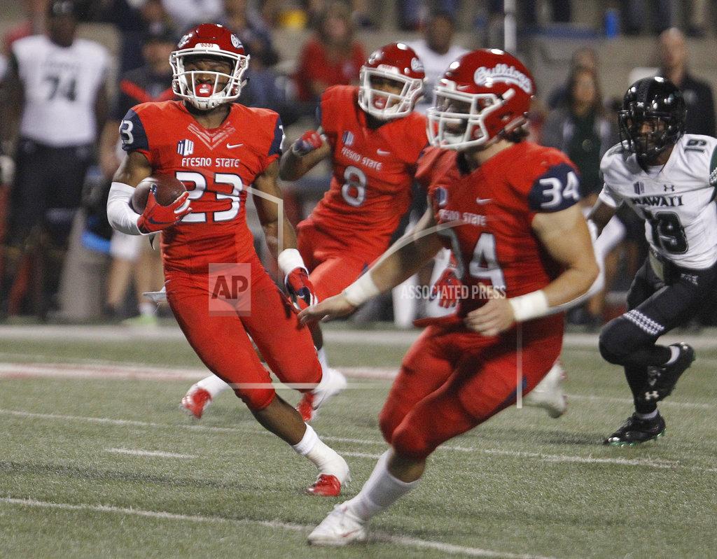 Gary Kazanjian Fresno State Juju Hughes runs back an intercepted pass against Hawaii during the second half of an NCAA college football game in Fresno, Calif., Saturday, Oct. 27, 2018. Fresno State won 50-20. (AP Photo/Gary Kazanjian)