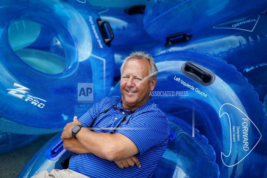 Chris Carlson Mark Lazarus, the president and owner of Lazarus Entertainment Group, poses for a picture, Thursday, July 9, 2020, in Myrtle Beach, S.C. Businesses in beach communities and mountain getaways up and down the East Coast are fretting about a shortage of workers as the summer season picks up steam. The concern comes after the Trump administration announced in June that it was extending a ban on green cards and adding many temporary visas to the freeze, including J-1 cultural exchange visas and H-2B visas. (AP Photo/Chris Carlson)