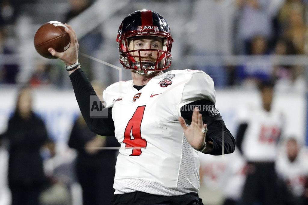 Mark Humphrey Western Kentucky quarterback Drew Eckels passes against Middle Tennessee in the first half of an NCAA college football game Friday, Nov. 2, 2018, in Murfreesboro, Tenn. (AP Photo/Mark Humphrey)