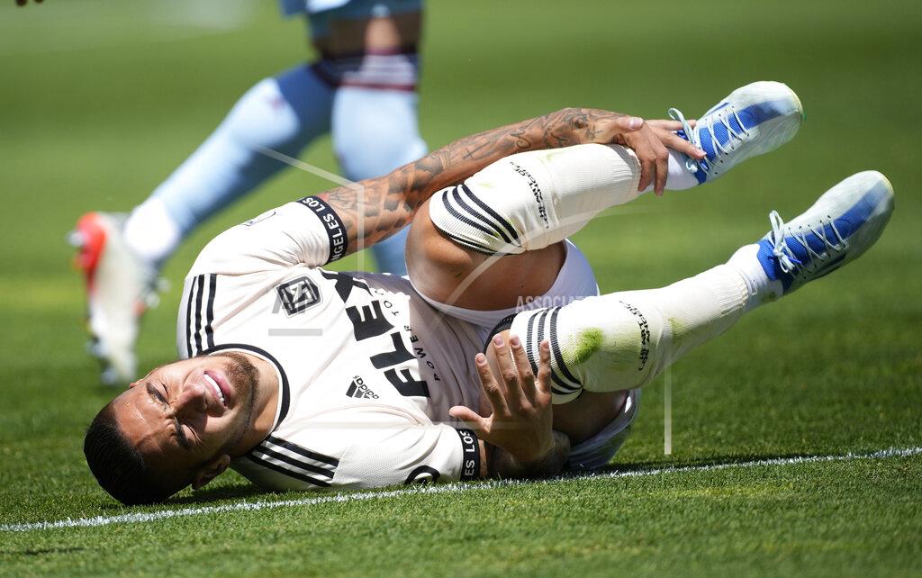 David Zalubowski Los Angeles FC forward Cristian Arango reacts after colliding with Colorado Rapids defender Auston Trusty in the first half of an MLS soccer match Saturday, May 14, 2022, in Commerce City, Colo. (AP Photo/David Zalubowski)