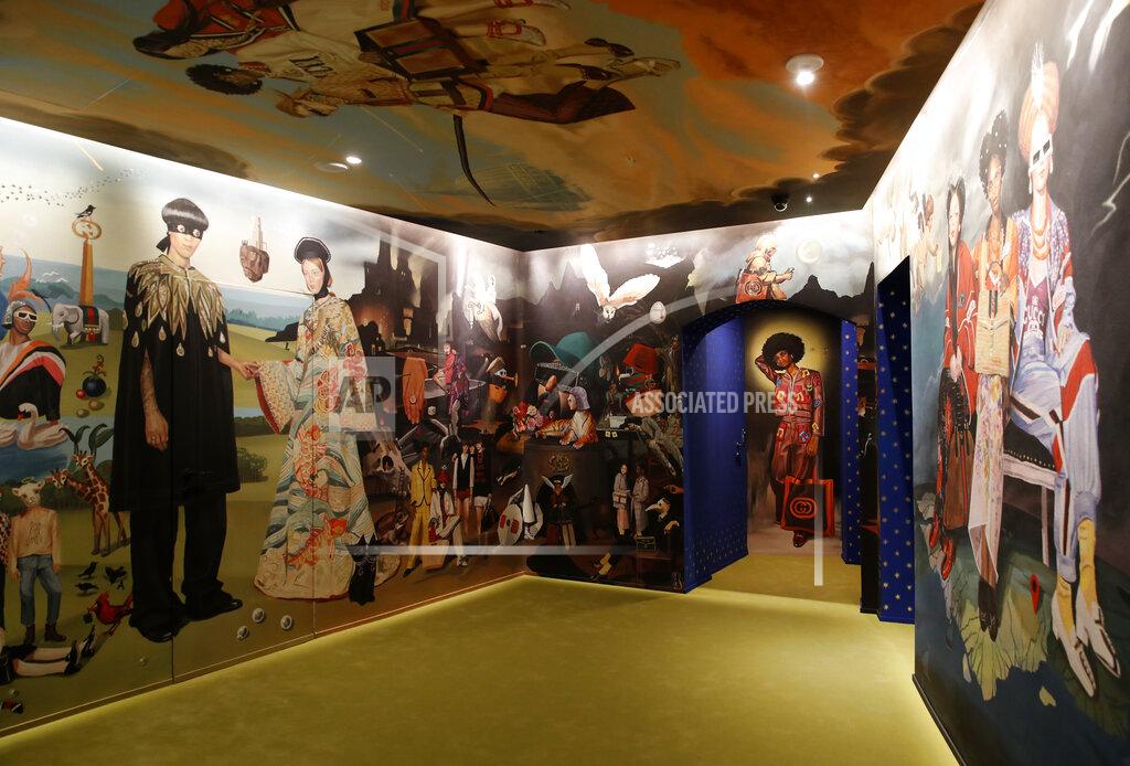 Antonio Calanni A view of a Gucci's advertisement campaign selected for an exhibition to celebrate creative vision of a creative director Alessandro Michele at Gucci Garden Archetypes, in Florence, Italy, Thursday, May 13, 2021. Alessandro Michele has radically shifted Gucci codes and challenged fashion norms in 6 ½ years as creative director at the brand founded by Guccio Gucci as a travel bag company in Florence 100 years ago. To mark the centenary, Michele has curated an exhibit in the brand's shop, restaurant and exhibition space, Gucci Garden, on Florence’s Piazza della Signoria, that underlines some watershed moments: An advertising campaign for perfume featuring a transgender model, an all-Black cast for Pre-Fall 2017 campaign, and a lipstick campaign featuring everyday faces in all their imperfections. (AP Photo/Antonio Calanni)