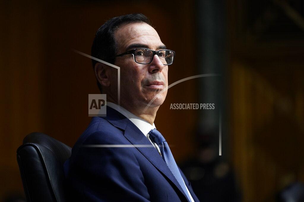 Susan Walsh Treasury Secretary Steven Mnuchin listens during a Senate Banking Committee hearing on 'The Quarterly CARES Act Report to Congress' on Capitol Hill in Washington, Tuesday, Dec. 1, 2020. (AP Photo/Susan Walsh, Pool)