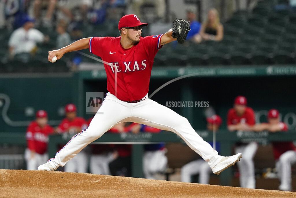 Lm Otero Texas Rangers starting pitcher Dane Dunning throws during the first inning of the team's baseball game against the Boston Red Sox in Arlington, Texas, Friday, May 13, 2022. (AP Photo/LM Otero)