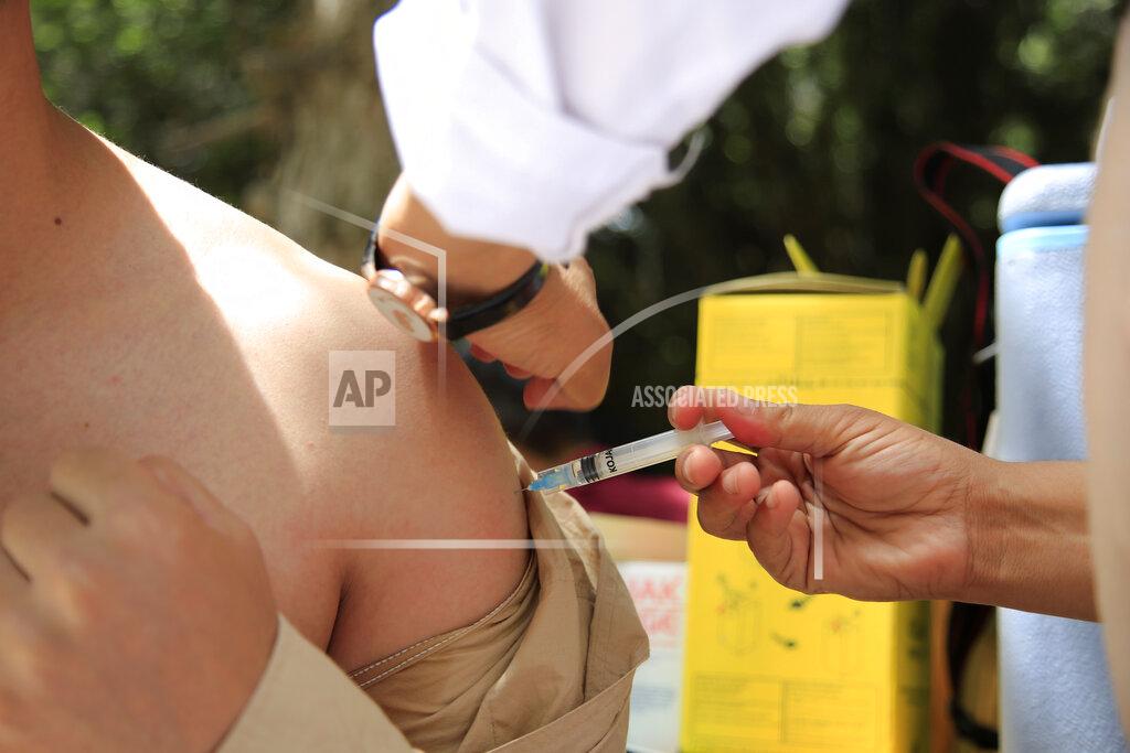 Mariam Zuhaib An Afghan student receives a dose of the Johnson & Johnson COVID-19 vaccine at Kabul University in Afghanistan, Thursday, July 29, 2021. (AP Photo/Mariam Zuhaib)