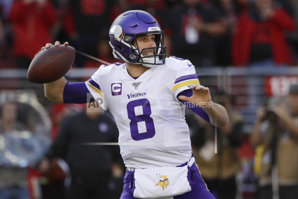 Keith Srakocic FILE - In this Jan. 11, 2020, file photo, Minnesota Vikings quarterback Kirk Cousins (8) passes against the San Francisco 49ers during the first half of an NFL divisional playoff football game in Santa Clara, Calif. The Minnesota Vikings and quarterback Kirk Cousins have agreed to a two-year contract extension, his agent Mike McCartney said Monday, March 16, 2020.(AP Photo/Marcio Jose Sanchez, File)
