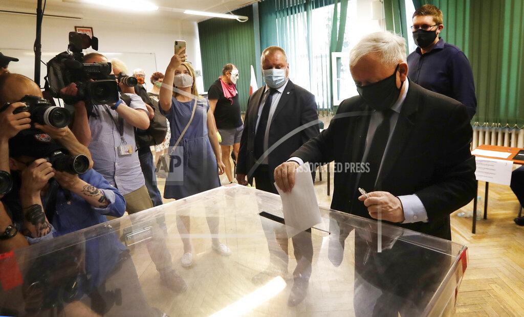 Petr David Josek Poland's main ruling party leader Jaroslaw Kaczynski casts his vote during presidential election in Warsaw, Poland, Sunday, June 28, 2020. The election will test the popularity of incumbent President Andrzej Duda who is seeking a second term and of the conservative ruling party that backs him. (AP Photo/Petr David Josek)