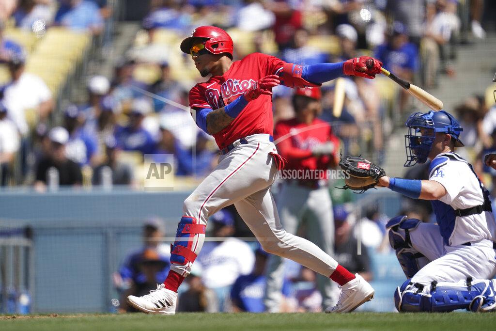 Ashley Landis Philadelphia Phillies' Johan Camargo doubles during the sixth inning of a baseball game against the Los Angeles Dodgers in Los Angeles, Sunday, May 15, 2022. (AP Photo/Ashley Landis)