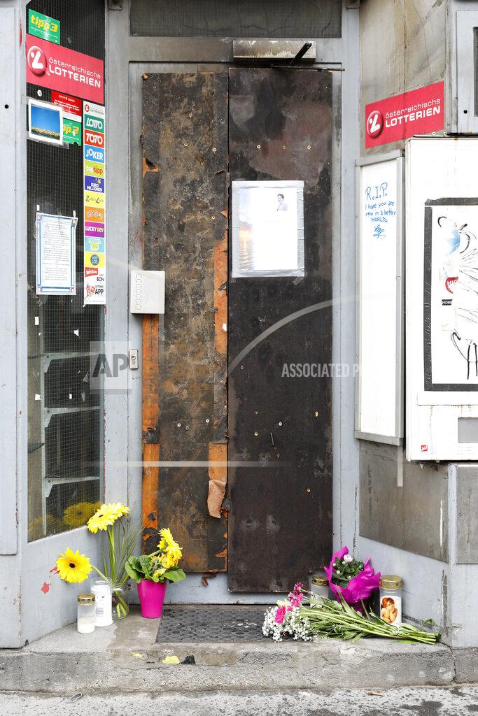 Lisa Leutner The entrance of the tobacco shop belonging to a woman who was covered on gasoline and lit on fire by her former partner Vienna, Austria, Friday, May 14, 2021. Austria is one of the few European Union countries where the number of women killed is higher than the number of men. The recent high-profile cases have led to widespread protests, demands for government intervention and condemnations from top politicians. (AP Photo/Lisa Leutner)