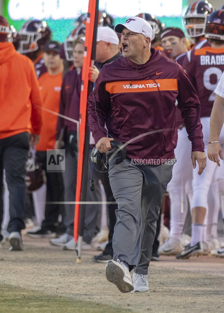 Matt Bell Virginia Tech head coach Justin Fuente reacts after believing a holding call was missed by officials following a pass intended for Damon Hazelton during the Boston College Virginia Tech Football game in Blacksburg, Va., Saturday, Nov. 3, 2018. (AP Photo/Matt Bell)