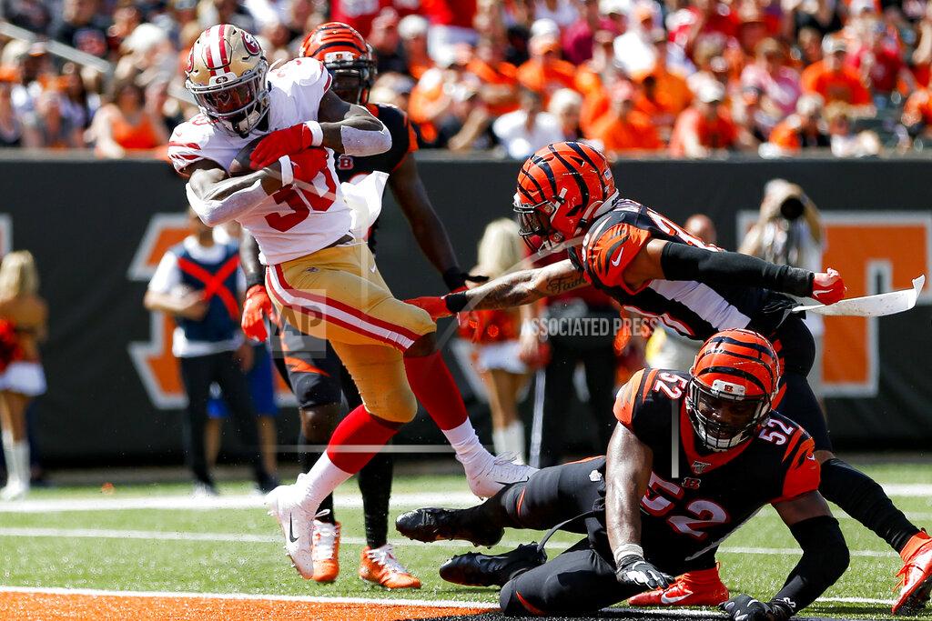 Gary Landers San Francisco 49ers running back Jeffrey Wilson (30) scores a touchdown during the first half an NFL football game against the Cincinnati Bengals, Sunday, Sept. 15, 2019, in Cincinnati. (AP Photo/Gary Landers)