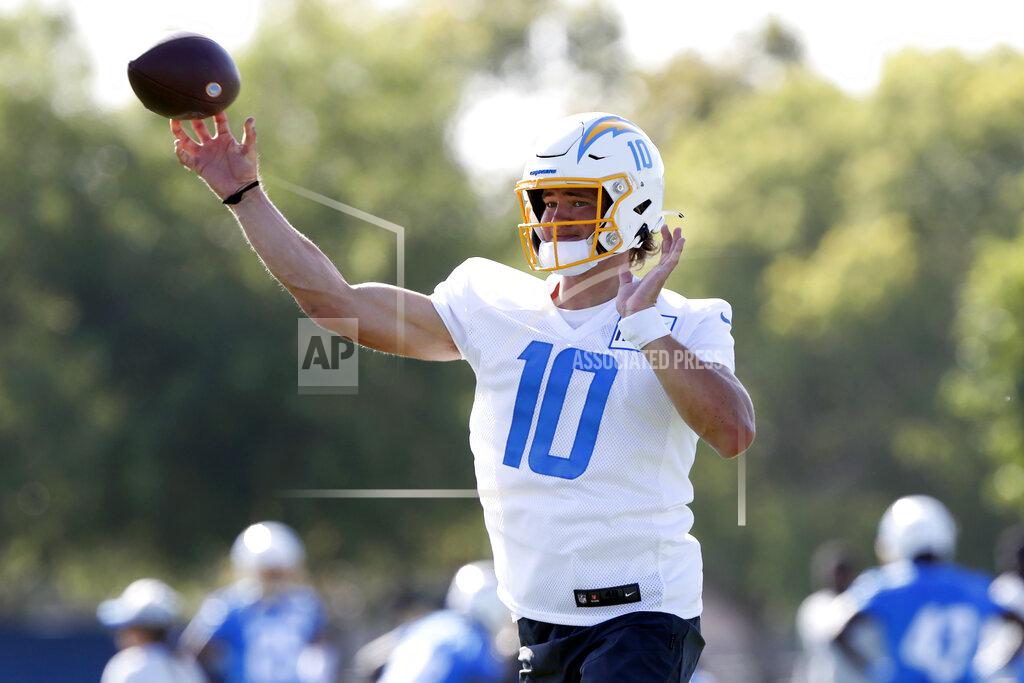 Alex Gallardo Los Angeles Chargers quarterback Justin Herbert throws a pass during practice at the NFL football team's training camp in Costa Mesa, Calif., Wednesday, July 28, 2021. (AP Photo/Alex Gallardo)