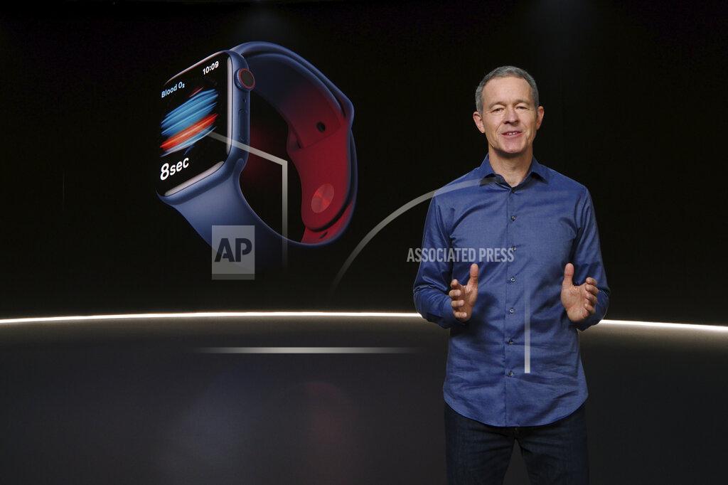 In this still image provided by Apple from the keynote video of a special event at Apple Park in Cupertino, Calif., Apple's Chief Operating Officer Jeff Williams unveils Apple Watch Series 6 on Tuesday, Sept. 15, 2020. Apple is introducing the cheaper version of its smart watch in its latest attempt to broaden the appeal of its trend-setting products while more consumers are forced to scrimp during ongoing fallout from the pandemic. (Apple via AP)