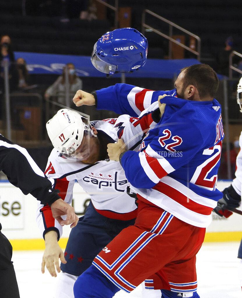 Bruce Bennett New York Rangers' Anthony Bitetto (22) and Washington Capitals' Michael Raffl (17) fight during the first period of an NHL hockey game Wednesday, May 5, 2021, in New York. (Bruce Bennett/Pool Photo via AP)