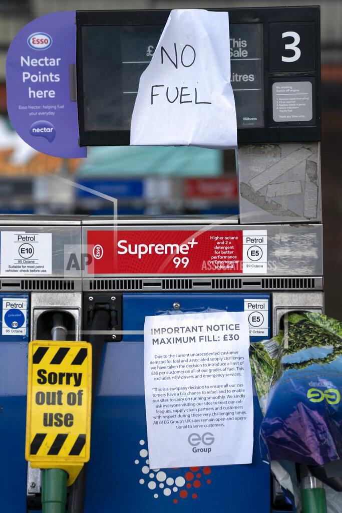 Jon Super Closed pumps are seen on the forecourt of a petrol station in Manchester which has run out of fuel after an outbreak of panic buying in the UK, Monday, Sept. 27, 2021. British Prime Minister Boris Johnson is said to be considering whether to call in the army to deliver fuel to petrol stations as pumps ran dry after days of panic buying. ( AP Photo/Jon Super)